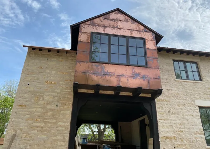 Copper metal panel facade on a stone building for Skylight Installation in Chicago Ridge