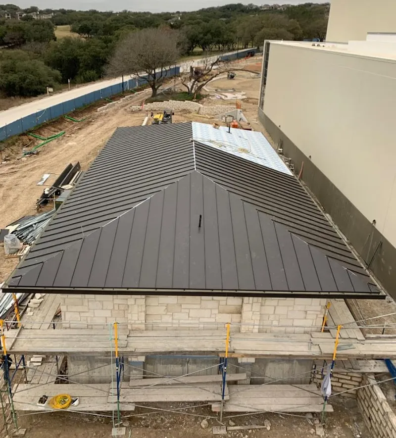 Metal roof new construction with scaffolding in Chicago Ridge
