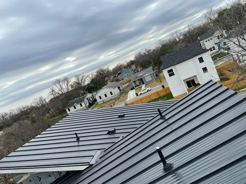 Standing seam metal roof panels with vents for Skylight Repair in Chicago Ridge